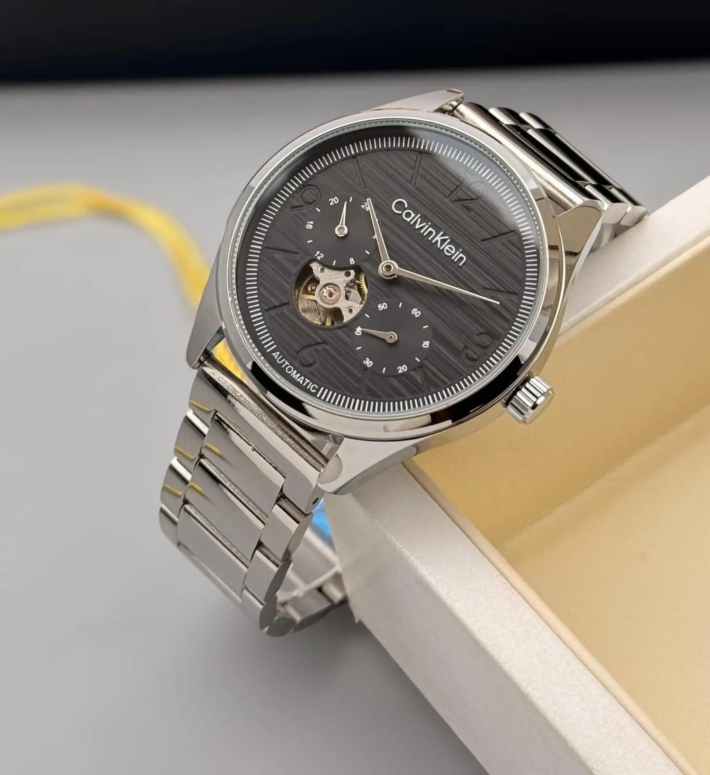 Men’s Calvin Klein Silver Automatic Watch – White Dial | GreatIndiaCart greatindiacart.com